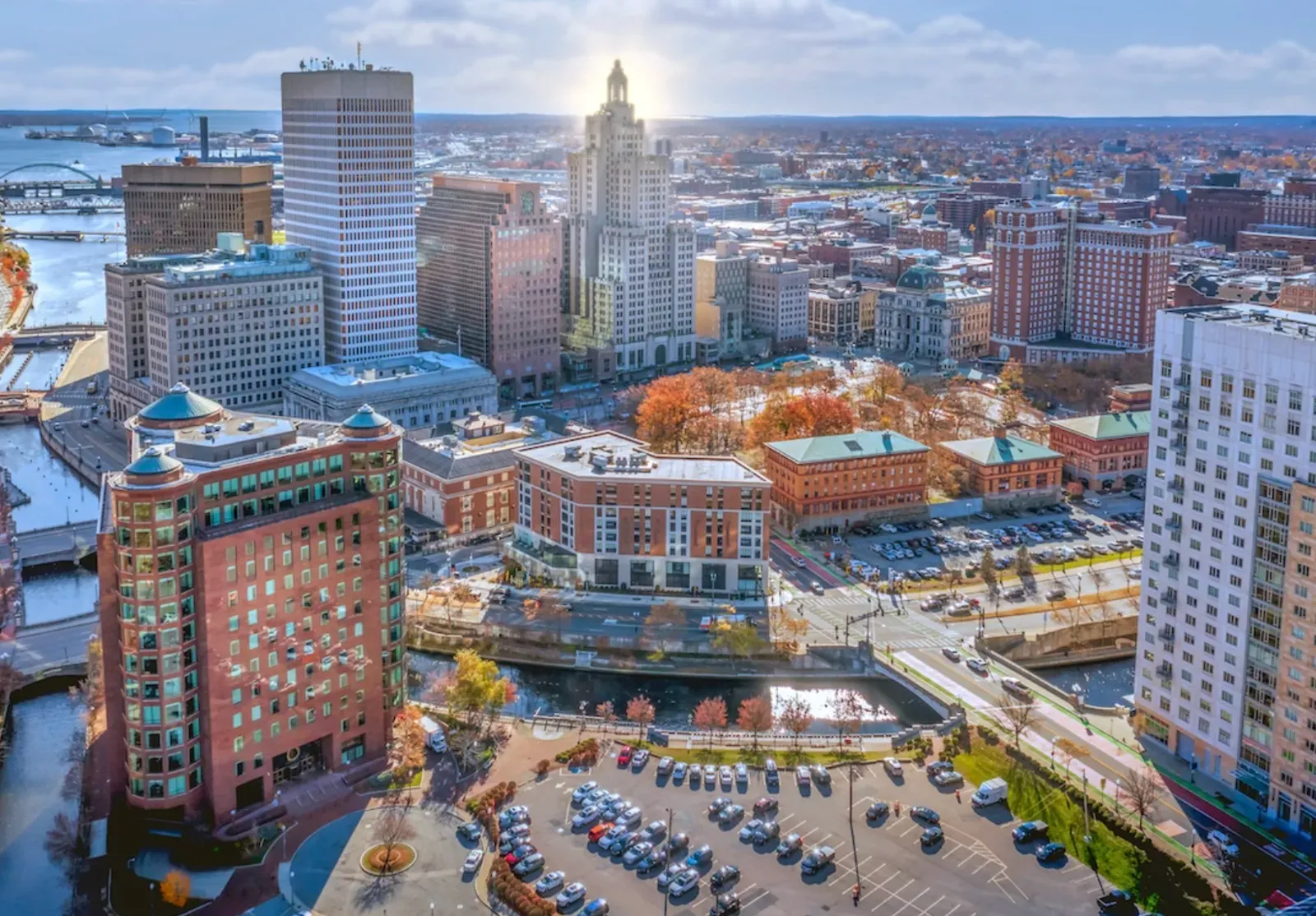 Aerial view of downtown Providence, Rhode Island — riverfront office towers and the Industrial Trust building on an autumn afternoon